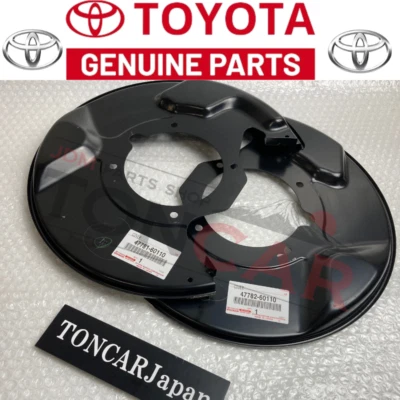 NUEVO Par de cubiertas antipolvo de freno delantero genuino Toyota Lexus LX470 Land Cruiser LC100 Foto 1 de 4