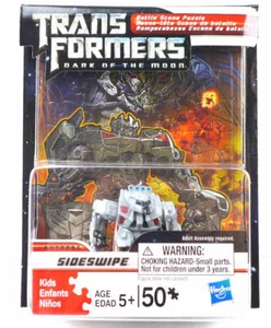 Puzzle scena battaglia Transformers Dark of the Moon con Modellino Autobot Sideswipe - Foto 1 di 7