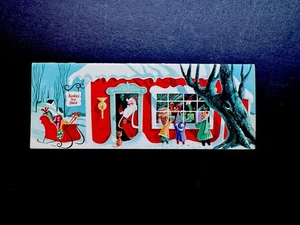 1 Vintage Weihnachtsgrußkarte Kinder besuchen den Spielzeugladen des Weihnachtsmanns mit Mistelzweig & Katze - Bild 1 von 3