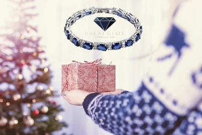 Pulsera de tenis con acabado oro blanco ovalado azul zafiro creado diamante post gratuito Foto 1 de 4