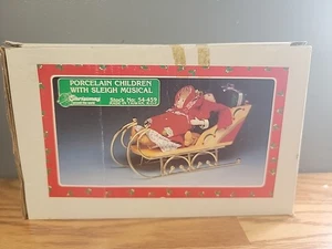 Trineo musical vintage de Navidad alrededor del mundo con porcelana para niños con caja - Imagen 1 de 6