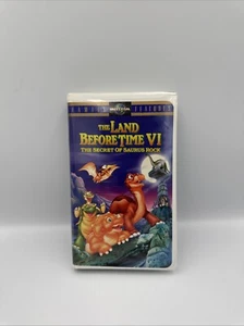 The Land Before Time VI (V-6) The Secret Of Saurus Rock-VHS Video Clamshell Tape - Picture 1 of 4