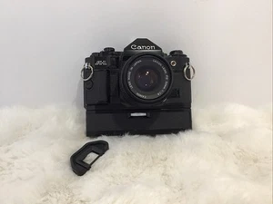 Canon A-1 35mm SLR Film Camera w/50mm FD lens,Power Rewind,Rubber Eyeguard 0276 - Picture 1 of 7
