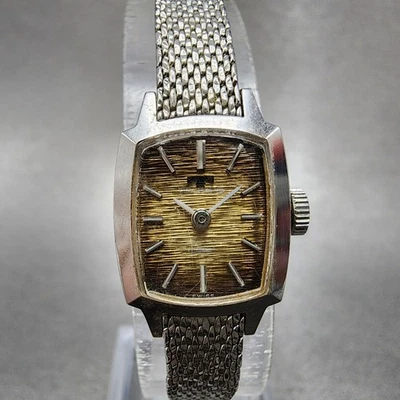 Technos Tank Watch Women 16mm Gold Dial Silver Tone Rectangle Manual Wind Runs - Image 1 of 4