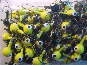 50 NEW  LEAD HEAD JIG HEADS 3/8 OZ.  WALLEYE JIGS YELLOW  BLACK 1/0 - Picture 1 of 4