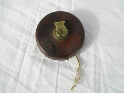 Ancien mètre de couturière gainé cuir 10 mètres début 1900  - Photo 1/4