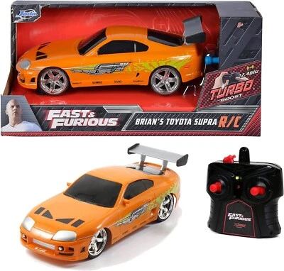 JADA FAST AND FURIOUS BRIAN'S TOYOTA SUPRA 1/24 DIECAST CAR ORANGE TOY VEHICLE - Image 1 of 4