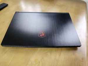 MSI GF63 Thin 11U Gaming Laptop i7 11800H RTX 3050Ti 15.6in Black - Picture 1 of 3