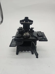 Estufa de hierro fundido miniatura media luna de colección muestra de vendedor - Imagen 1 de 13