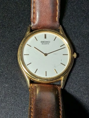 Винтажные мужские часы Seiko 34 мм золотистый белый циферблат 7N00-8008 новый аккумулятор - Изображение 1 из 3