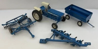 Ford 4600 Tractor Wide Front 1/12 ERTL Bottom Plow Grain Wagon Transport Disk - Image 1 of 4