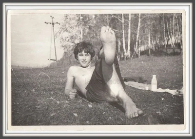 Sunbather Guy 22yo lying on grass Handsome lone man Bare legs feet photo Gay Int - Image 1 of 3