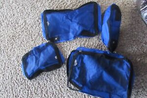 NEW/unused 4 piece set cloth & mesh zippered travel pouch luggage organizer cube
