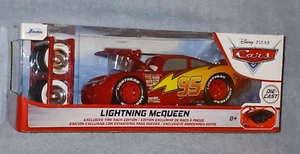 Disney Pixar Cars Lightning McQueen Jada 1:24 Diecast with Tire Rack - Picture 1 of 4