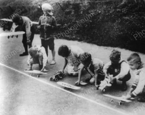 Children Play With Propelled Toys 8x10 Reprint Of Old Photo - Picture 1 of 1