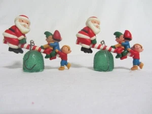 VINTAGE AVON SANTA & ELFS ON GUMDROP & CANDY CANE SEE - SAW ORNAMENTS SET OF 2 - Picture 1 of 2