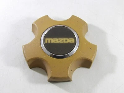 Mazda 626 MX-6 1988-1989 cubierta de cubo de tapa central de rueda OEM de fábrica Foto 1 de 4