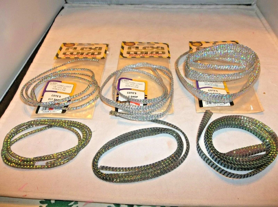 Flexi-Cord Luz 1/8" 1/4" 3/8" Holográfica Plateada, Perla Negra para Atar Moscas Foto 1 de 1