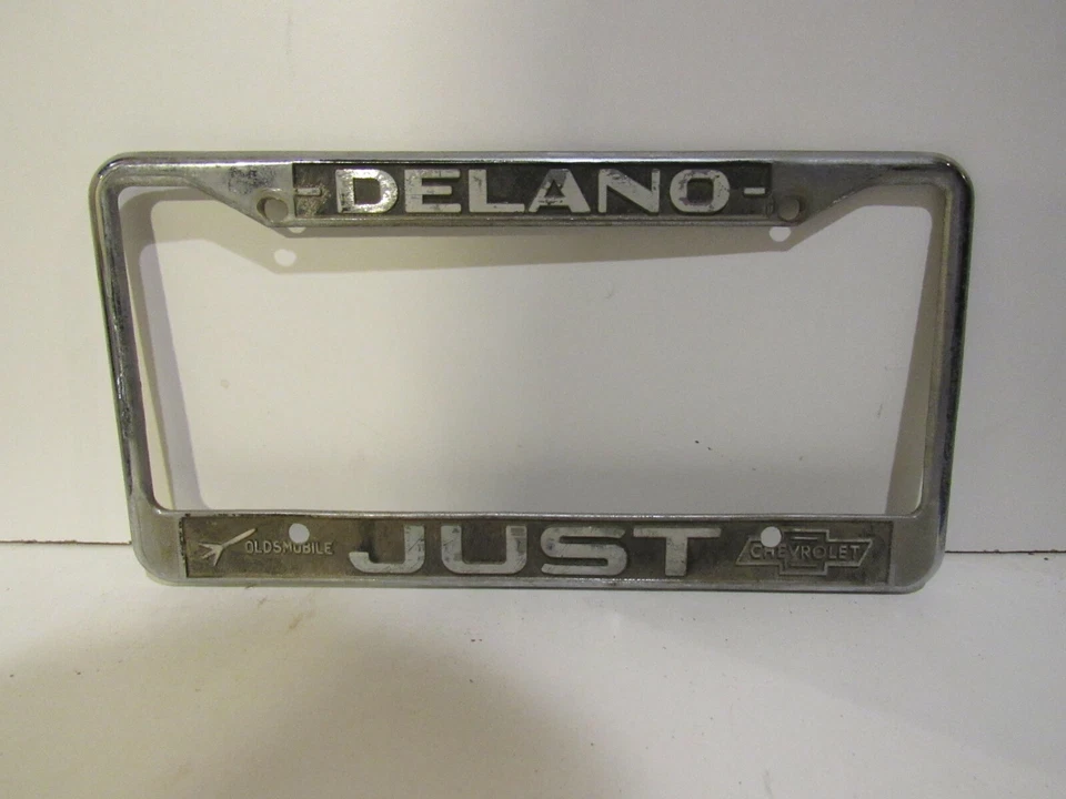 Delano Just Oldsmobile Chevrolet Dealership License Plate Frame Holder   - Imagem 1 de 1