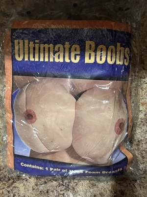 Disfraz de Halloween Ultimate Boobs para adultos - 1 par de enormes pechos de espuma - sin correa Foto 1 de 4