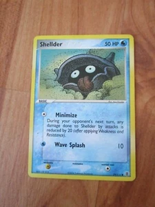 COMMON SHELLDER 79/112 EX FEUERROT BLATTGRÜN SET POKEMON KARTE - Bild 1 von 1