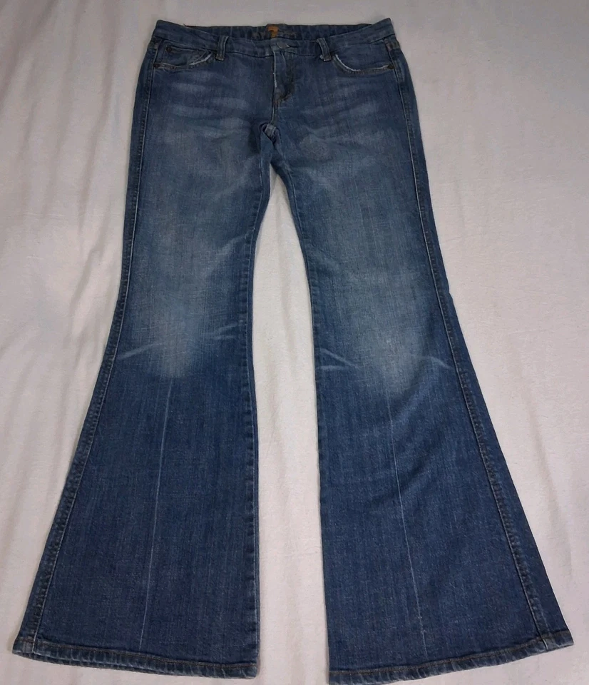 Pantalones de mezclilla Seven for All Mankind tiro bajo para mujer talla 27 A bolsillo acampanado lavado medio Foto 1 de 4