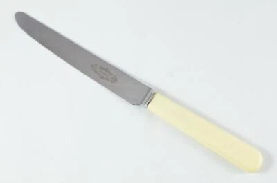 Nuovissimo coltello da tavolo manico crema originale finitura a specchio realizzato a Sheffield