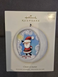 Hallmark Keepsake Ornament Cheer-O-Meter Santa con luz mágica y sonido 2008 - Imagen 1 de 1