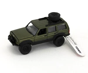Johnny Lightning *DUNKELGRÜNMETALLIC* Jeep Cherokee 4x4 *ERTL SAMMLERSTÜCKE* - Bild 1 von 1