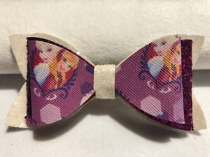 ANNA AND ELSA HAIR BOW, 3.5" X 1.75", PURPLE, WHITE W/ ANNA AND ELSA ON TOP - Picture 1 of 3