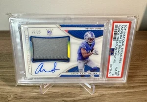 National Treasures Amon-Ra St. Brown 2021 parche de tesoro de novato automático RC/25 PSA  - Imagen 1 de 2