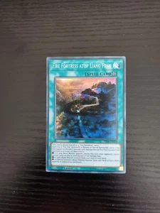 Fire Fortress atop Liang Peak - Yugioh 1st Ed Secret Rare - FIGA-EN018 - Picture 1 of 2