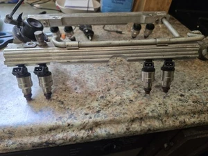 1985 86 87 88 CAMARO iroc z28 gta FIREBIRD TPI Fuel Rail + new Injectors GM - Picture 1 of 8