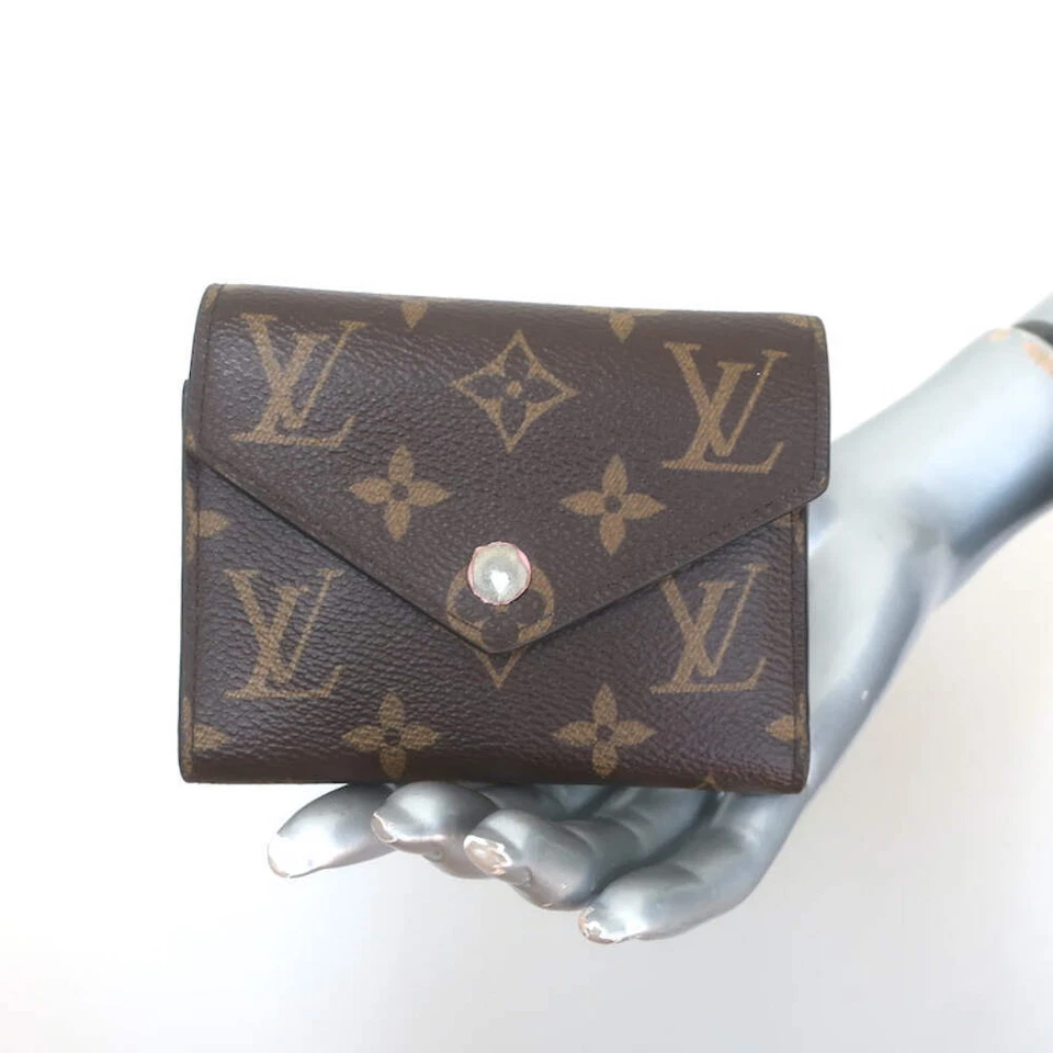 Cartera Louis Vuitton Victorine marrón monograma lona y rosa bailarina Foto 1 de 4