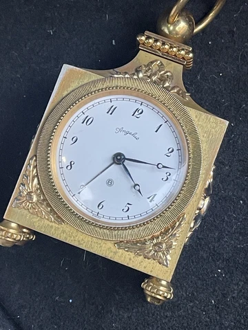 Bronze Angelus Swiss windup table clock Cover