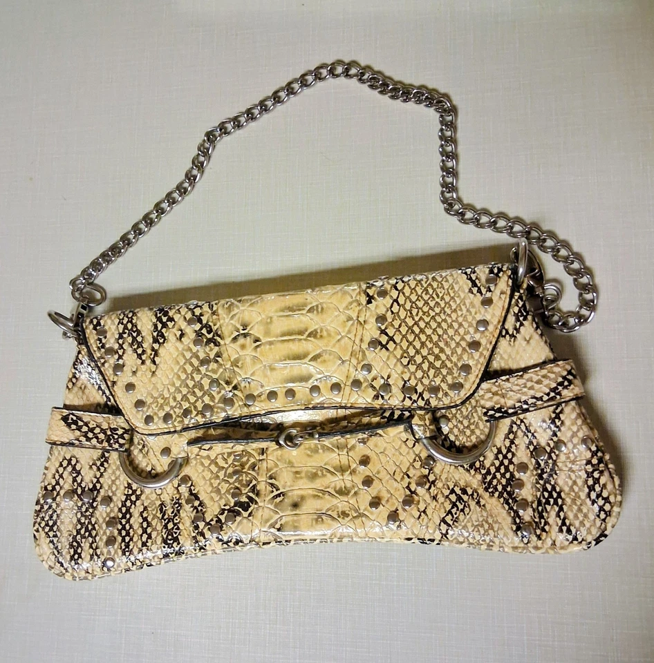 Cartera clutch vintage de piel de serpiente con herrajes de broca de caballo Foto 1 de 3