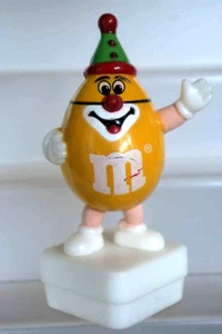 M&M'S RARE FIGURINE BOUCHON CACAHOUETTE JAUNE EN CLOWN 9 CM DE HAUTEUR - Picture 1 of 1