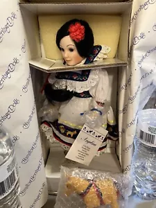 Bambola porcellana internazionale per bambini "ANGELINA" di Cynthia Woodie Hamilton - Foto 1 di 6
