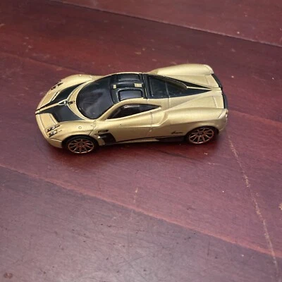 2012 Hot Wheels HW EXOTICS Gold 2012 Pagani Huayra Super Car Mattel Diecast - Image 1 of 4