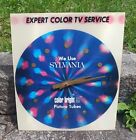Horloge revendeur hologramme vintage Sylvania couleur vive 85 tube photo