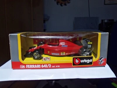 Formula UNO --Burago 1-24--Ferrari  641/2--BERGER numero gara 28-Nuova in Box-- - Immagine 1 di 3