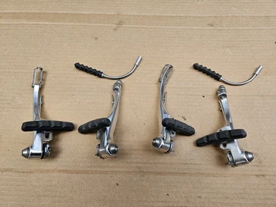 Bicicleta híbrida de montaña ProMax TX32 frenos en V tracción lineal juego trasero delantero plateado Foto 1 de 4