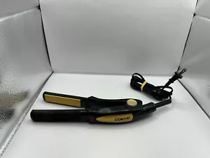 Plancha plana Conair CS4 negra/amarilla - Imagen 1 de 7