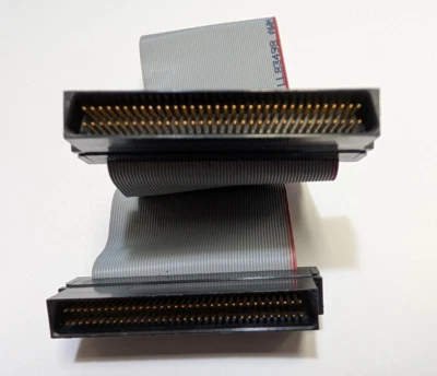 8 Inches SCSI 3, HPDB68 flat male to male cable, for one device, 2 connectors. - Image 1 of 4