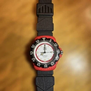 Reloj TAG Heuer Formula 1 385.513/1 clásico de cuarzo 200M esfera roja blanca para hombre 34 mm - Imagen 1 de 7
