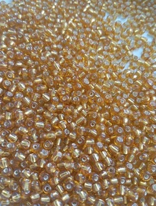 Job Lot of 200g Large Seed Beads Size 6/0 (3.4-4mm) Silver Lined Light Amber - Picture 1 of 3