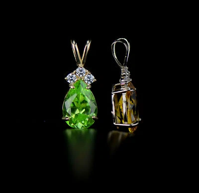 Colgante de piedra de nacimiento de pera circonita cúbica de oro amarillo de 14k Foto 1 de 4