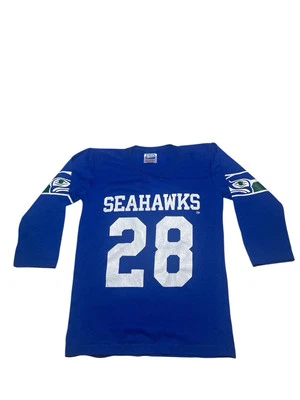 Rawlings vintage años 80 CURT WARNER Nº 28 SEATTLE SEAHAWKS Fútbol Talla M 10-12 Y Foto 1 de 3