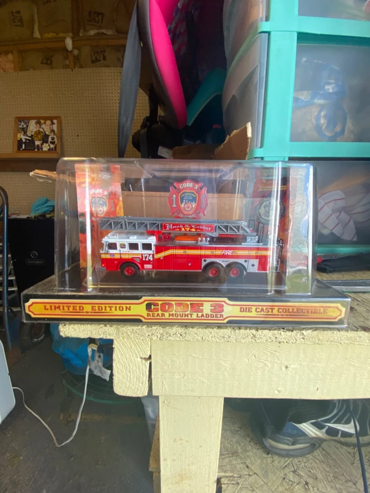 code 3 FDNY Rear mount Seagrave Hook & Ladder 174. Never open - Image 1 of 1