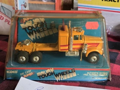 1979 KIDCO ЖЕСТКИЕ КОЛЕСА КАЛИФОРНИЯ САМОСВАЛ 1/50 KENWORTH W900 НОВЫЙ В ЗАПЕЧАТАННОЙ КОРОБКЕ  - Изображение 1 из 4